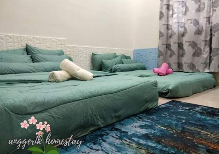 Anggerik Homestay Dungun Kampong Sura Tengah ภายนอก รูปภาพ